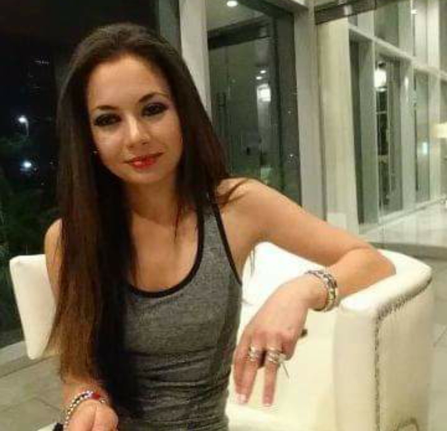 Jennifer Jorgensen Ahmed seated in a modern interior